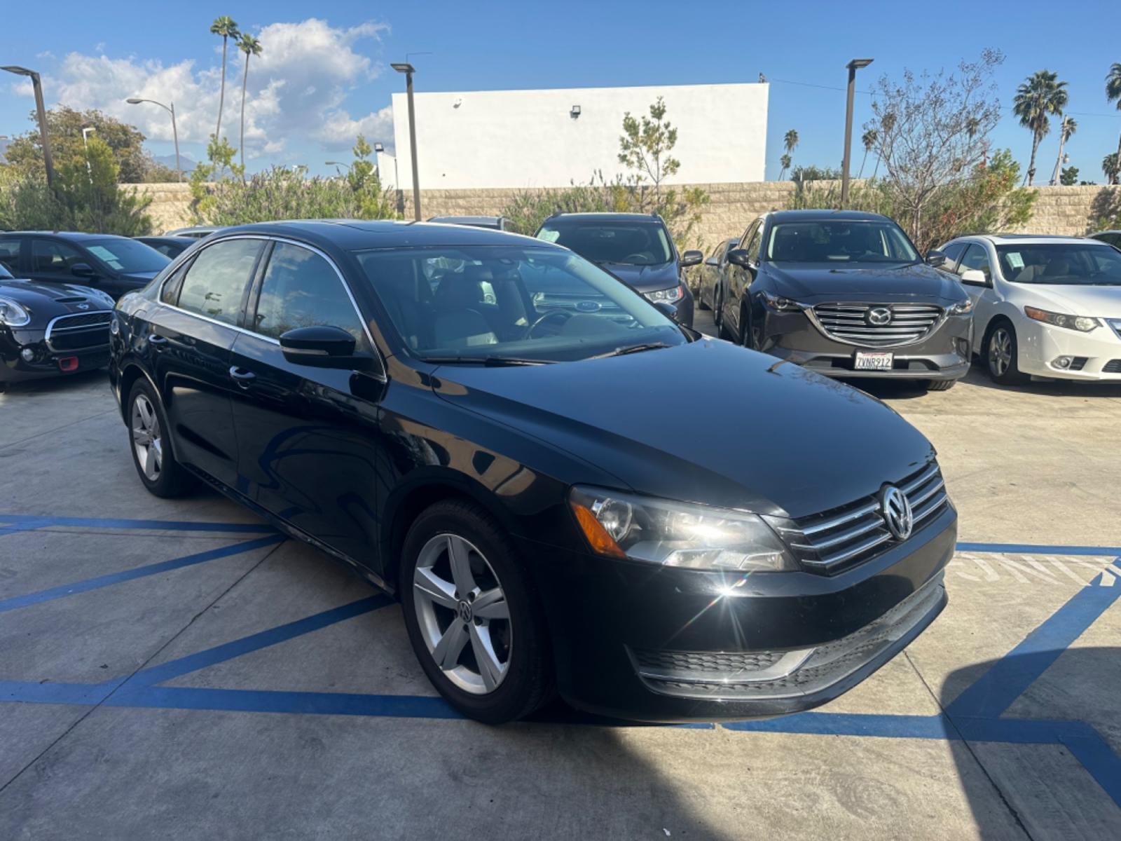 2013 Black /BLACK Volkswagen Passat (1VWBP7A30DC) , located at 30 S. Berkeley Avenue, Pasadena, CA, 91107, (626) 248-7567, 34.145447, -118.109398 - Low Miles!! Crown City Motors is a used “Buy Here Pay Here” car dealer in Pasadena CA. “Buy Here Pay Here” financing, means that when you purchase your vehicle from our dealership, that you make the payments to the dealership as well. We do not need the banks approval to get you approved - Photo #7